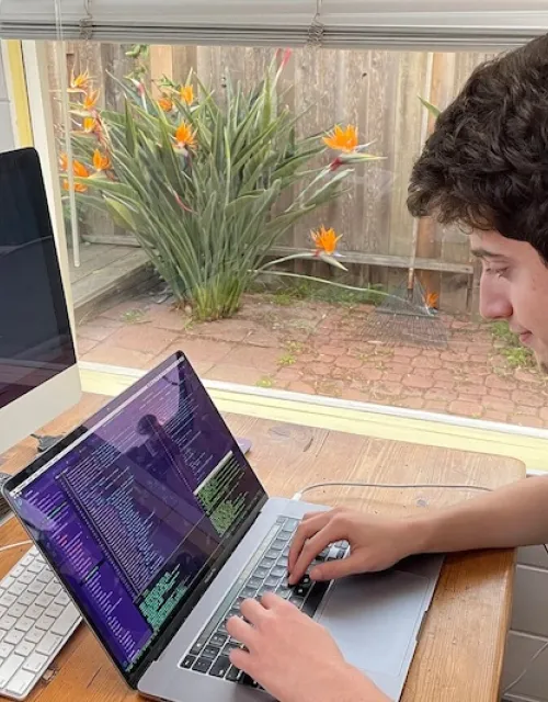 Avi Schiffmann works on the website UkraineTakeShelter, created with fellow Harvard student Marco Burstein. The website helps Ukrainian refugees connect with host families.