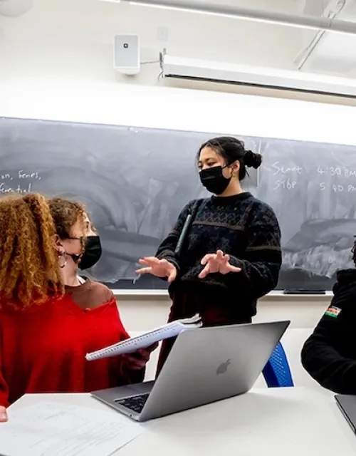 First-years Joanna Walters (from left) and Raquel Reis seek help on Psets, or problem sets, from course assistants Jocelyn Wang and Ivy Tirok.
