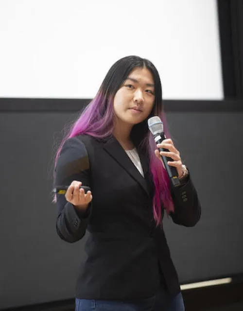 Catherine Yeo addresses the crowd at the SEAS/HBS Technology Showcase at the Science and Engineering Complex in Allston.