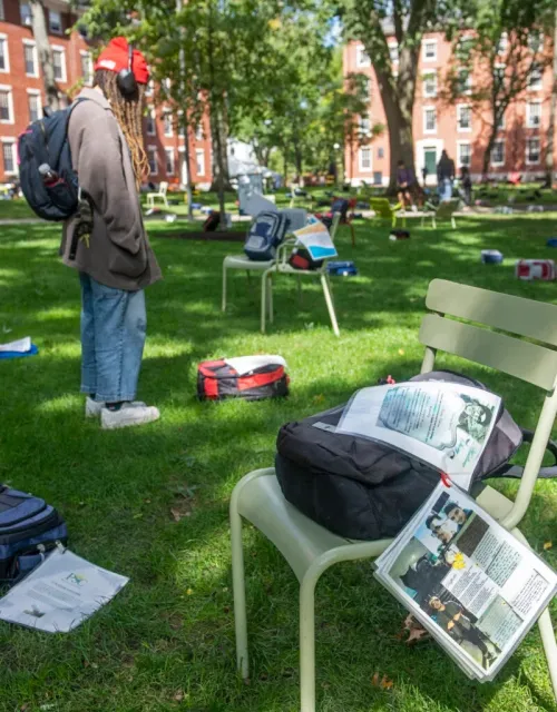 Many of the backpacks on display in the Yard were paired with the stories of the students who carried them.