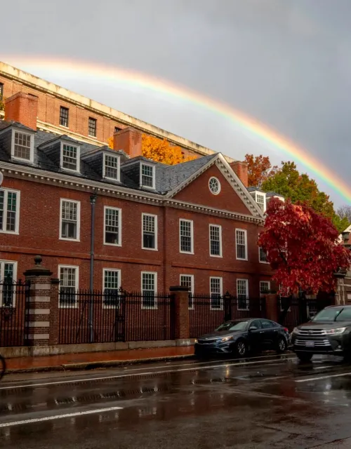 Harvard University and a rainbow provide the backdrop for Harvard Square.
