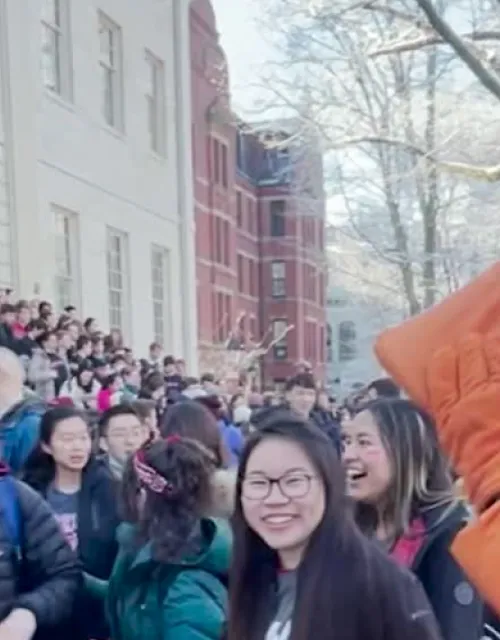 students outside university hall on housing day