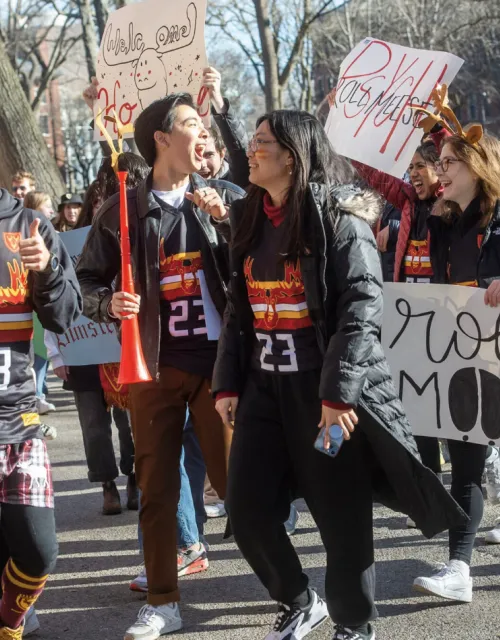 Representatives from Dunster House announce their arrival in Harvard Yard early Thursday morning.