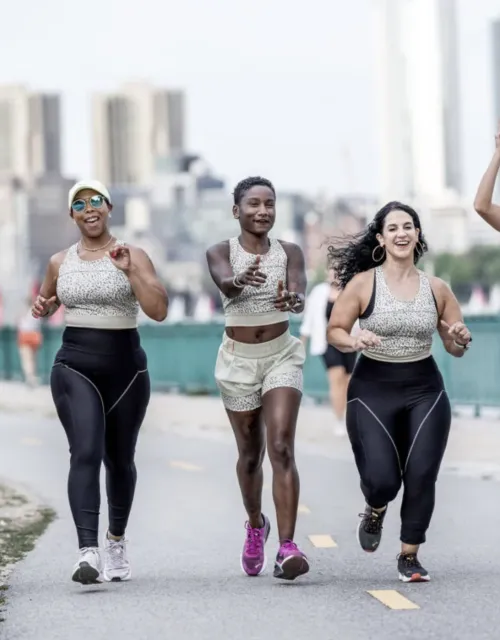 Alia Qatarneh (far right) runs the 2022 Boston 10K for Women with fellow members of the run crew TrailblazHers, Erin Wallace (from left), Angel Babbitt Harris, Abeo Powder, and Elaine Kordis.