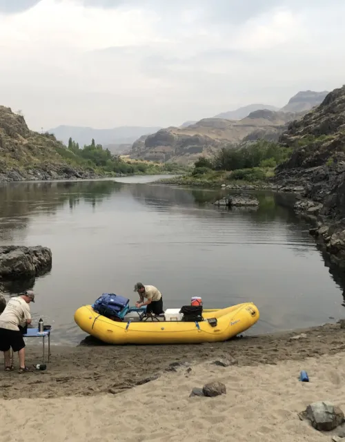 Elijah McGill ’24 navigating the Pacific Northwest’s Snake River in raft with fellow rangers.