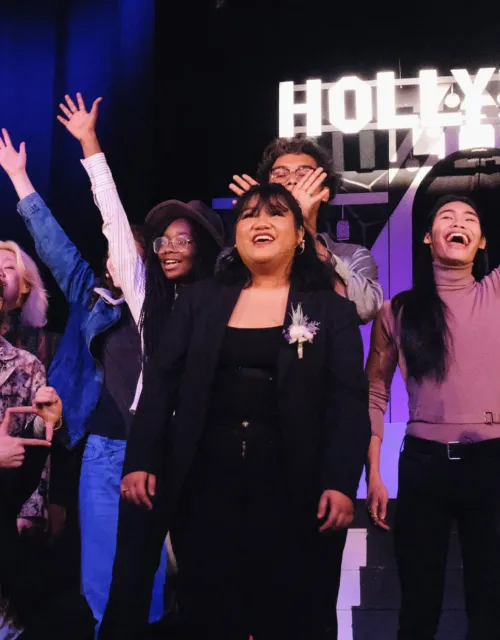 Singers onstage from "ISCARIOT," which reimagines Judas as a queer Asian American teenager attending a posh Los Angeles high school.