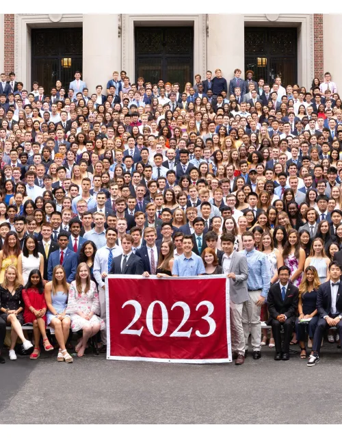 Group photo with red 2023 banner