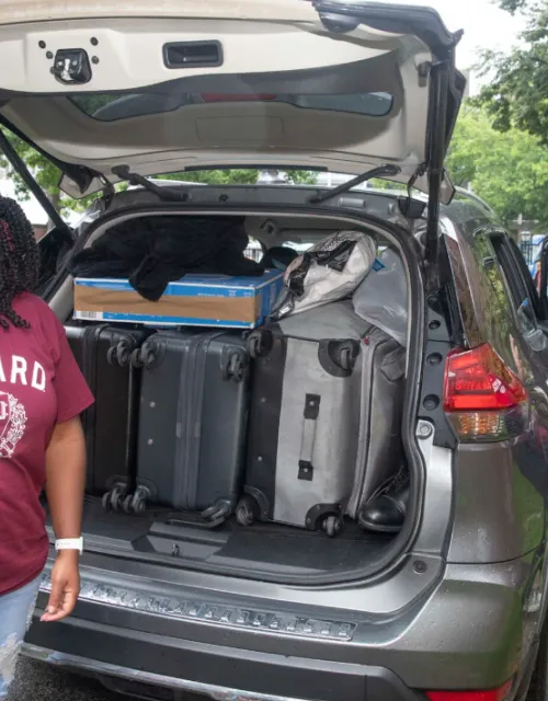 Dontae Christie ’27 (right) made the move from San Antonio, Texas, to Canaday Hall. His mom, Joy Christie, starts the big unpack.
