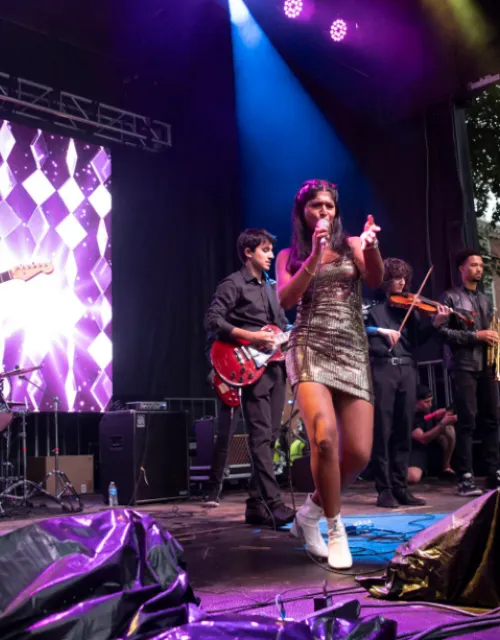 Anoushka Changer ’25 (center) performs with the student band Charles Revival as part of the festivities commemorating Claudine Gay’s inauguration.