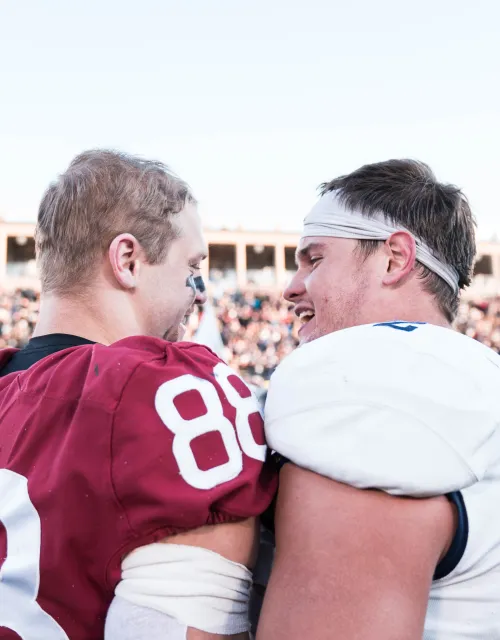 A football player from the Harvard and Yale team talking. 