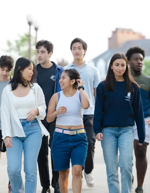 A group of Harvard students walking together. 