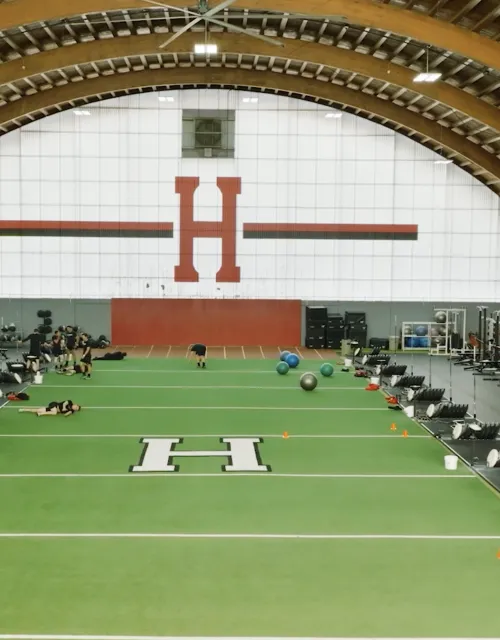 Students working out in the Harvard Athletics gym