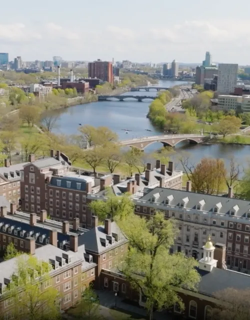 Aerial view of Charles River and campus and bell tower
