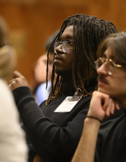 Summit participants listening to Keith Whittington’s remarks.