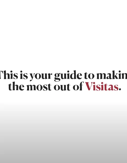 White sign that says "This is your guide to making the most of Visitas"