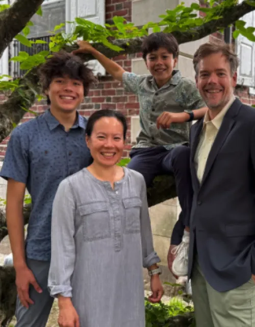 Incoming interim faculty deans of Kirkland House Peter Huybers and Downing Lu with their children.