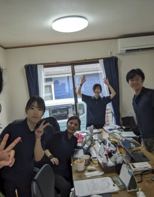 Kai Wong '26 (left) and the home care team in Shiroishi, Japan.