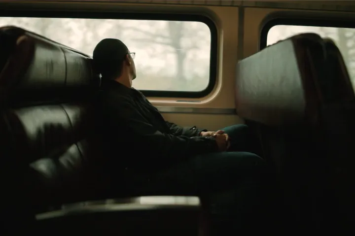 Student riding train