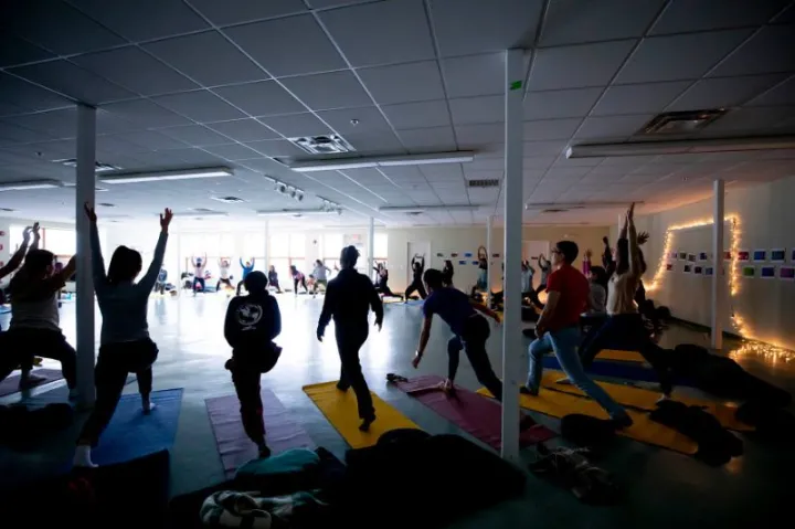 Students participate in a mindful movement and meditation session.