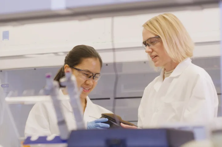 faculty member and student in lab