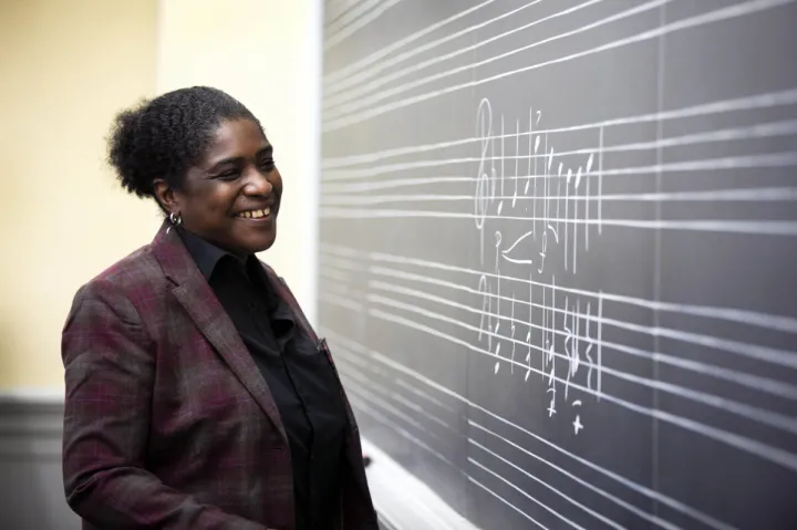 Yvette J. Jackson, the Assistant Professor, Department of Music, stands in her classroom.