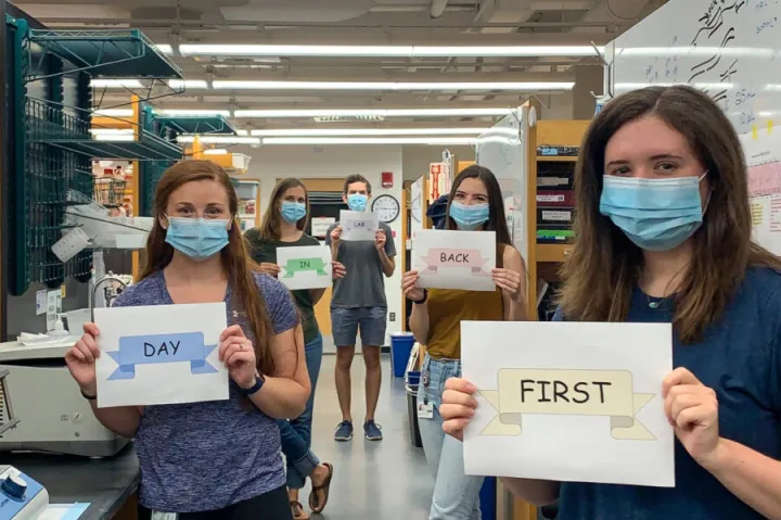 Manning Lab members celebrate their first day back in the lab in June 2020.