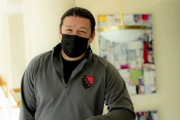 Donning a different piece of Pfoho garb from his vast collection, Mario Leon posts to Instagram to stay connected with the students.