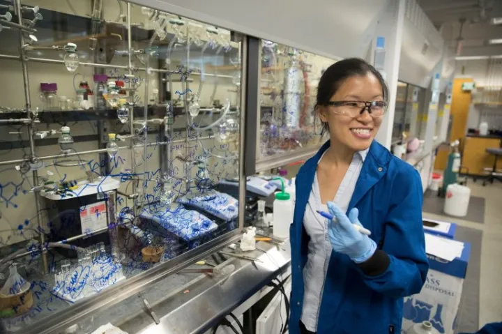 Christina Woo works in her Lab in the Conant Building.