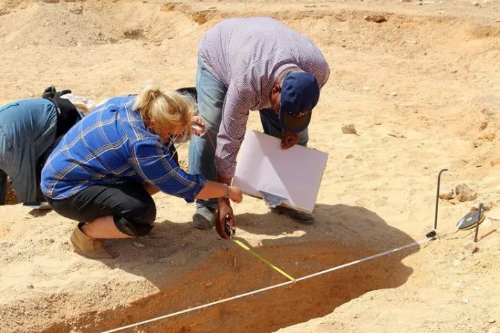 Kate Rose (left) working with colleagues at Amarna, an Egyptian archaeological site.
