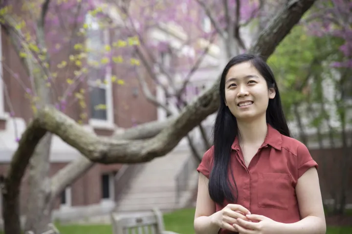 Truelian looking at the camera at Harvard