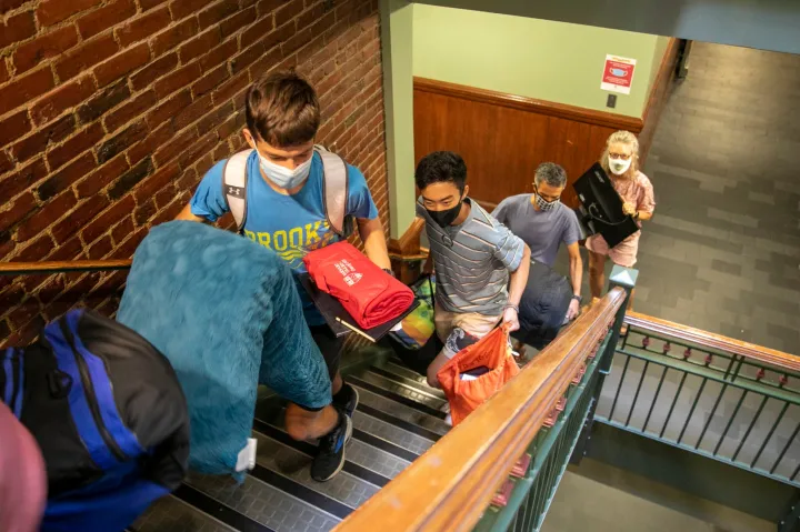 Keegan Harkavy ’25 (from left) leads the way. Matt Tengtrakool ’25 is followed by Harkavy’s parents, Brad Harkavy and Ann Marie Mador.