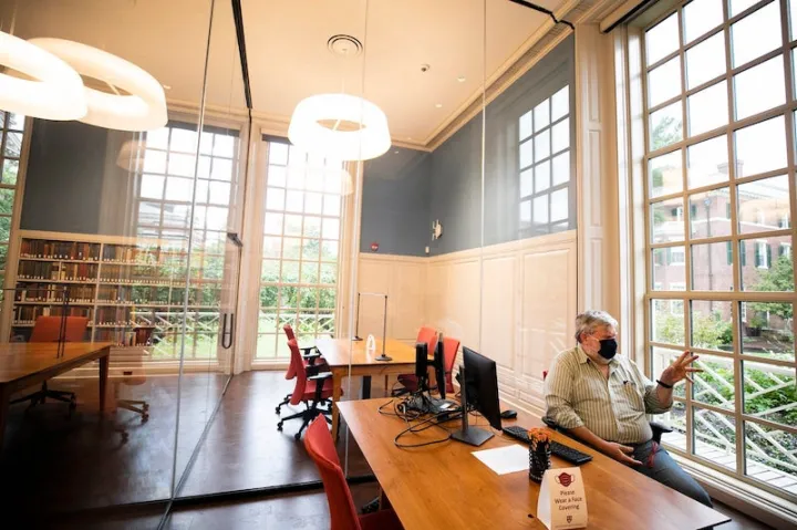 Lewis Day (pictured) speaks from the new reading room desk.