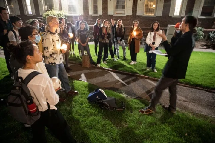 Outside Kirkland House, Lowell Brower (right) meets with students from his “Supernatural Storytelling” course. The students are headed to Kirkland's library to ask the resident spirit a few questions.