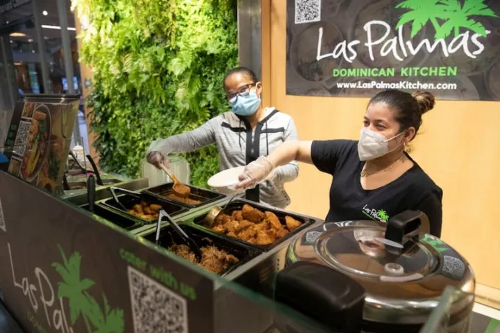 Maritza Hernandez (left) and Delores Martinez showcase Las Palmas’ featured fare.