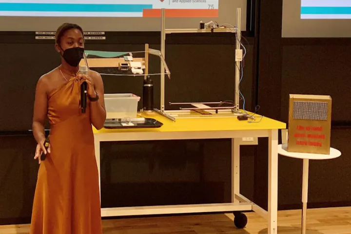 Kaylee Cornelius, '23, presents her team's prototypes to the Harvard Office for Sustainability at the Science and Engineering Complex in Allston.