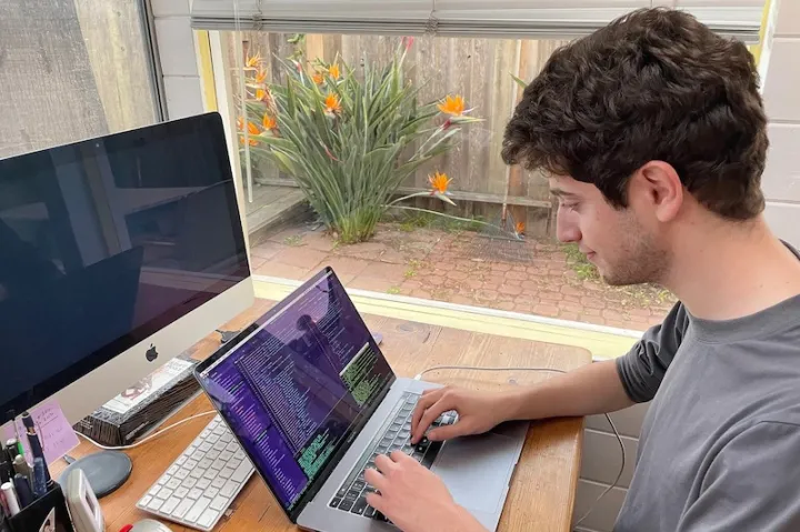 Avi Schiffmann works on the website UkraineTakeShelter, created with fellow Harvard student Marco Burstein. The website helps Ukrainian refugees connect with host families.