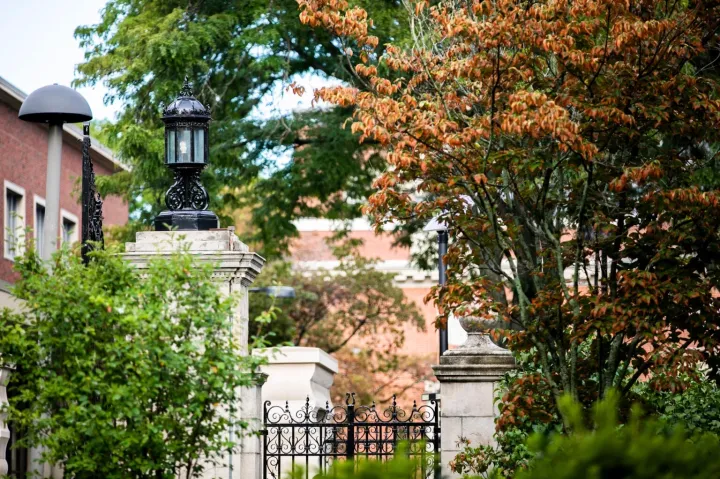 The gate outside Lamont Library.