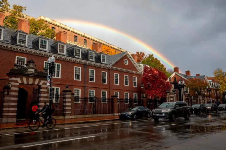 Harvard University and a rainbow provide the backdrop for Harvard Square.