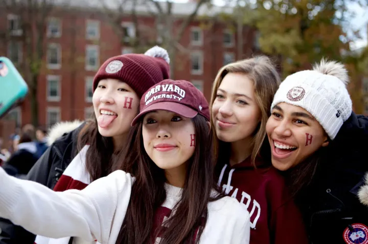 4 girls taking a selfie at Harvard Yale