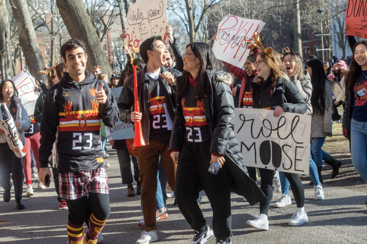 Representatives from Dunster House announce their arrival in Harvard Yard early Thursday morning.