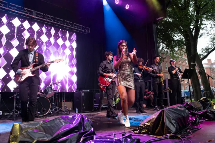 Anoushka Changer ’25 (center) performs with the student band Charles Revival as part of the festivities commemorating Claudine Gay’s inauguration.