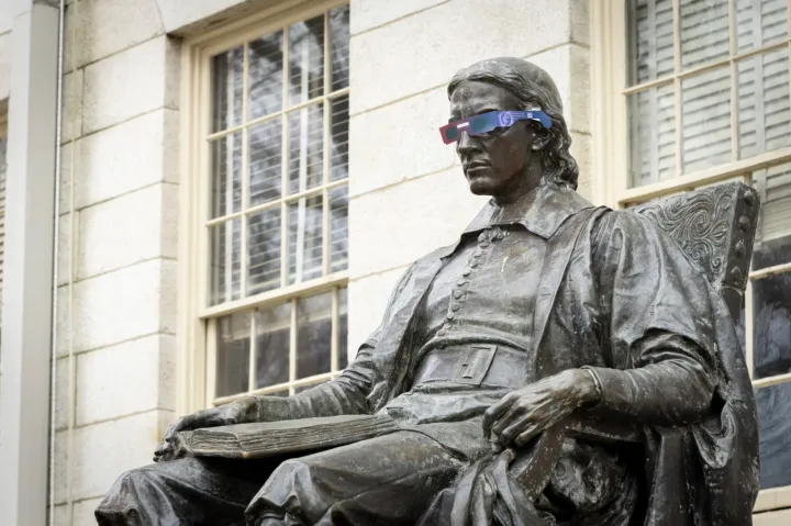 John Harvard wearing sun glasses 