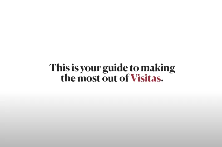 White sign that says "This is your guide to making the most of Visitas"