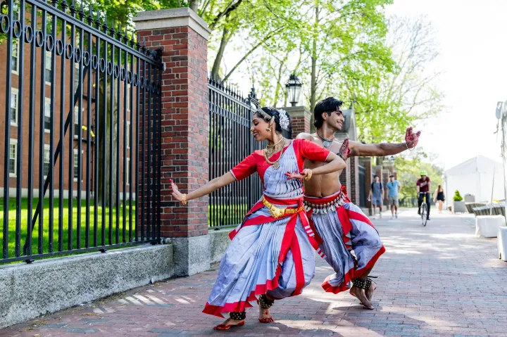 Anugraha Raman ’12 (left) and Kohal Das warm up for their performance on Science Center Plaza.