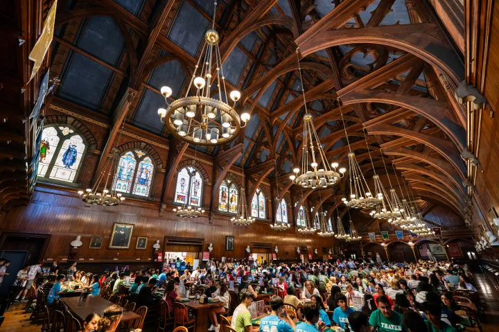 The inside of Annenberg Hall is full of students dining.