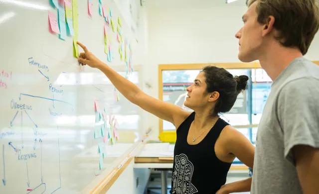 two students in a classroom