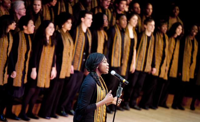 Harvard Kuumba singers performing on stage