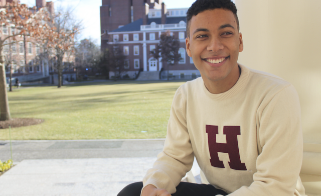 Student sitting in Radcliffe Yard