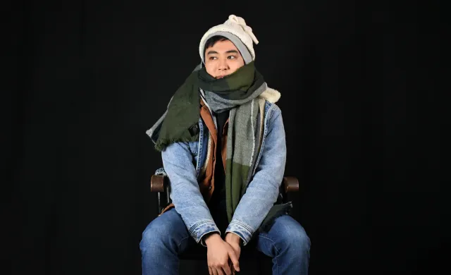Person wearing many layers of clothing
