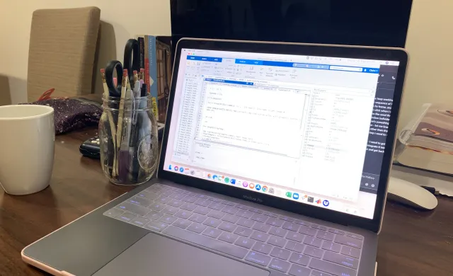 Desk Workspace with Computer and Work